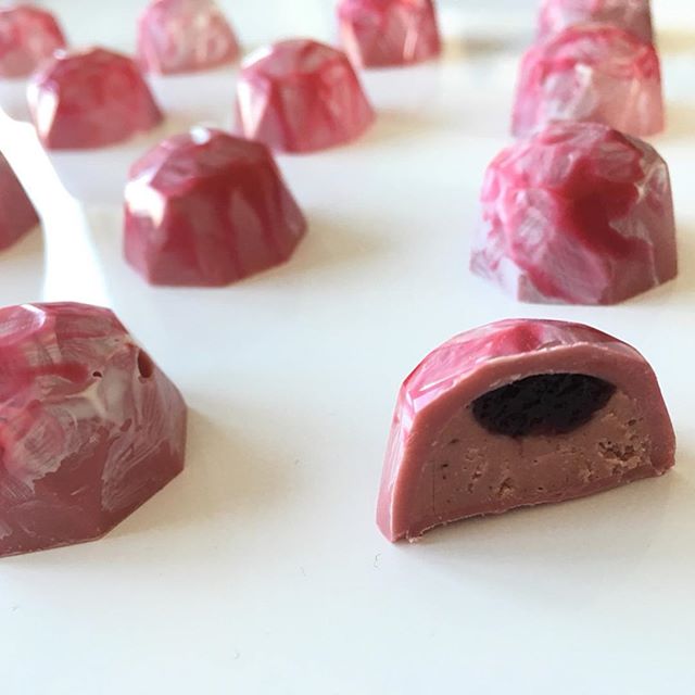 Ruby hazelnut praline with spiced raspberry.